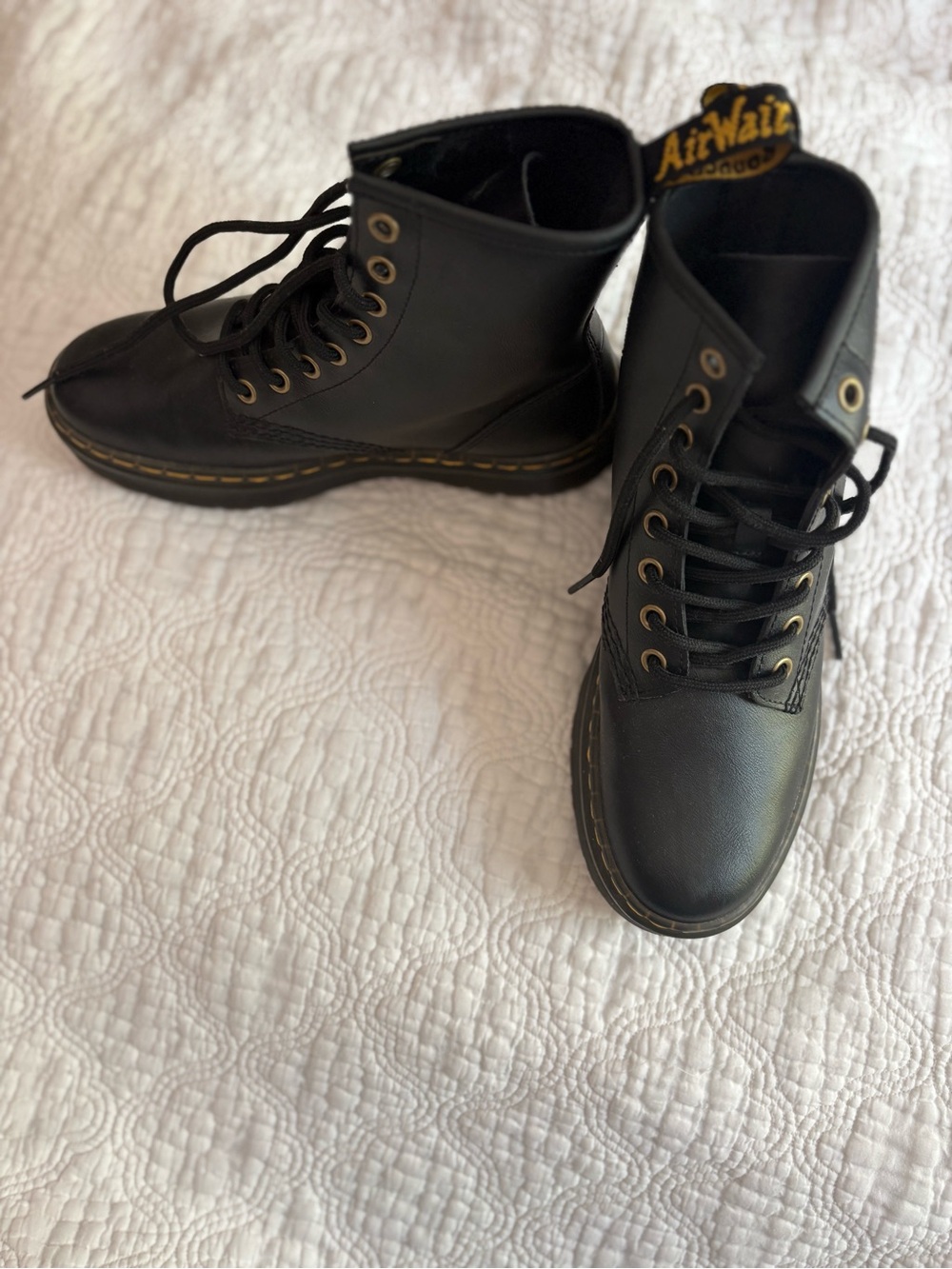 Dr. Martens Black Leather 8-Eye Lace-Up Boots with Yellow Stitching